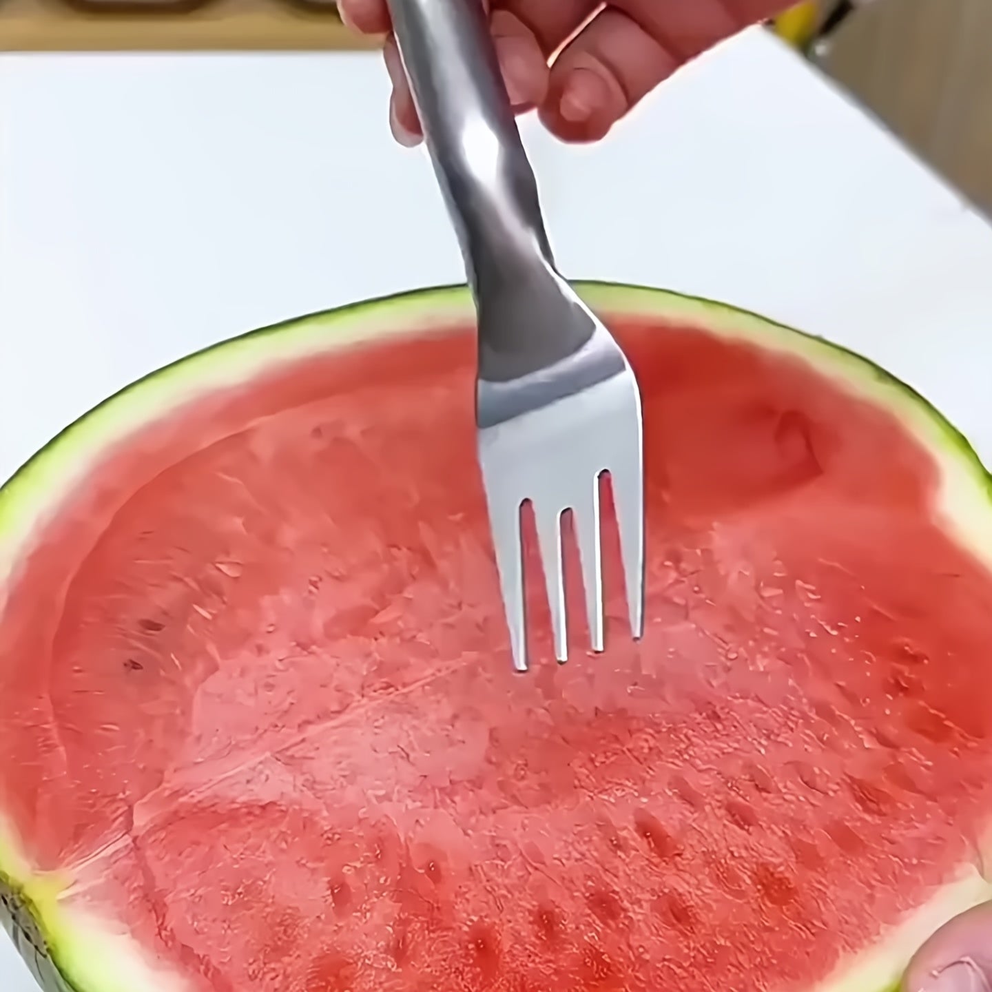 1pc two-in-one stainless steel watermelon slicer and fork | Multi-functional kitchen tool, easy to cut and serve | Durable and rust-proof | Perfect for home and restaurant use, fruit service tool | Dual-function design | Durable kitchenware